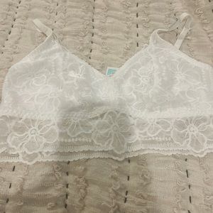 Victoria Secret Pink brand white bralette. NWT. Lace detailing. Unlined. Size L.
